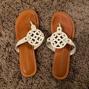 Report sandals, brand new.